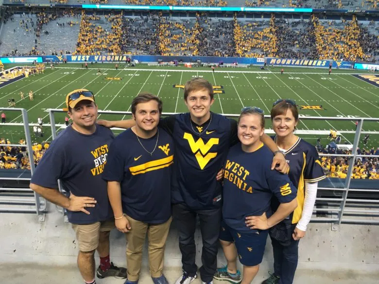 Dr. Burns and his family at a football game